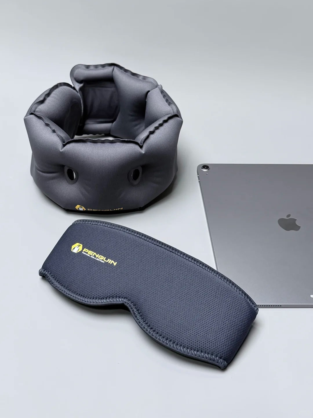 NOWYSM inflatable travel neck pillow with matching eye mask