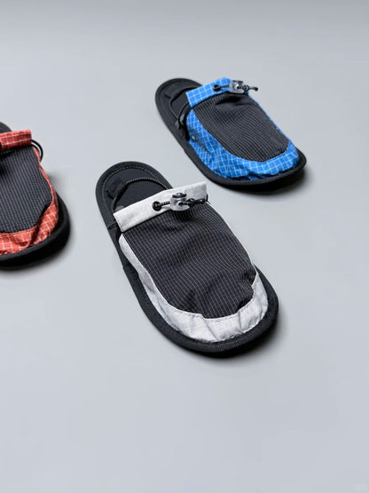 NOWYSM lightweight travel slippers with technical outdoor styling