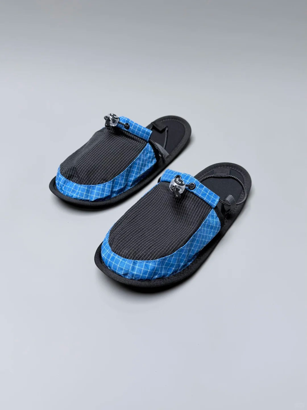 Packable travel slippers designed for everyday journeys